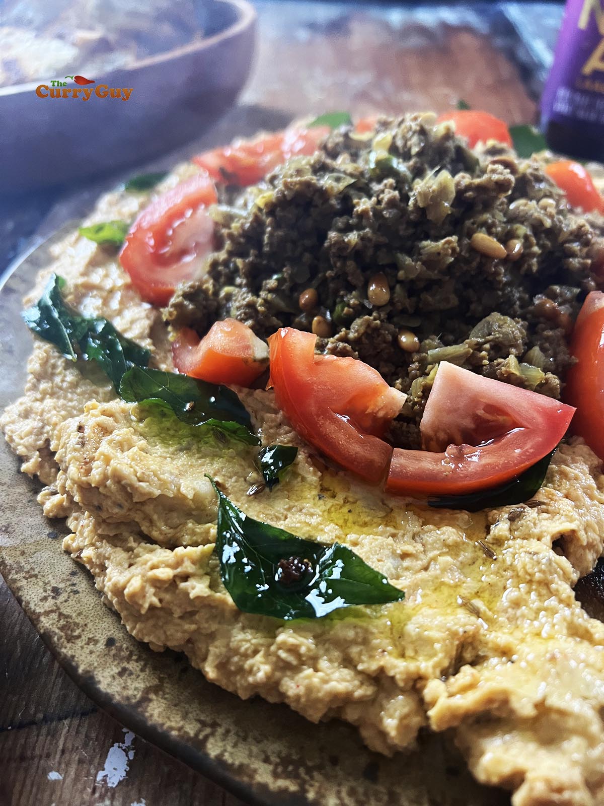 Prepared and ready beef keema with tandoori hummus.