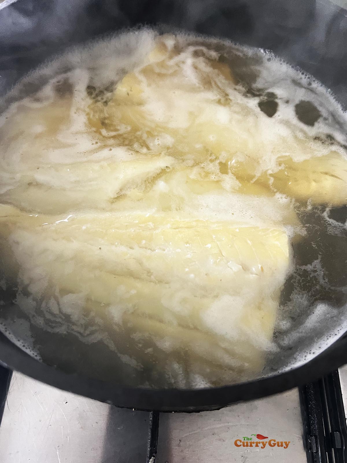 Poaching smoked haddock.