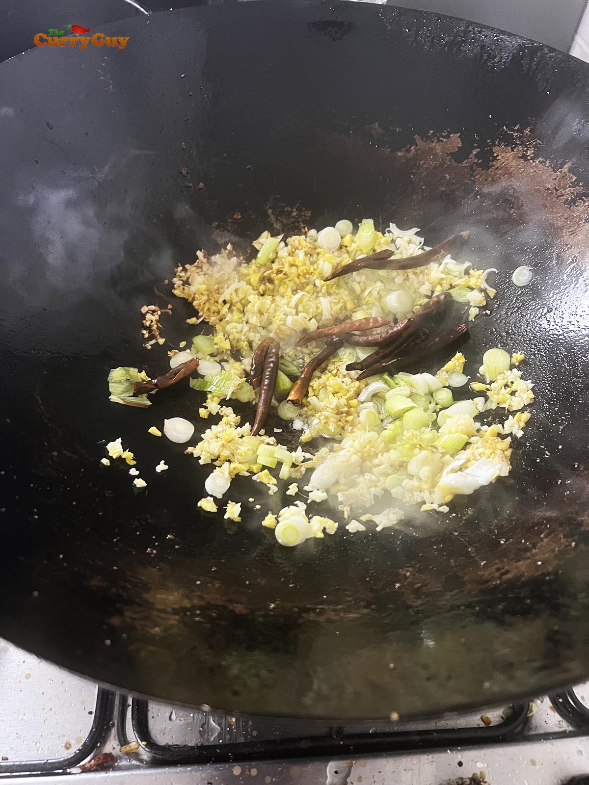 Frying the aromatic ingredients. 
