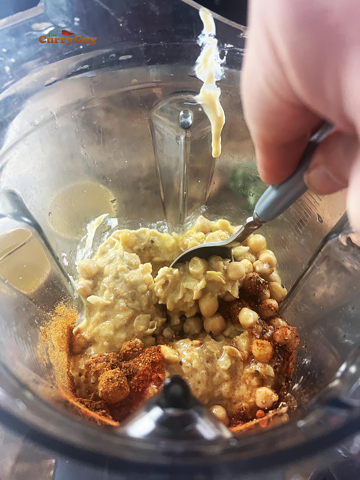 Blending the hummus.