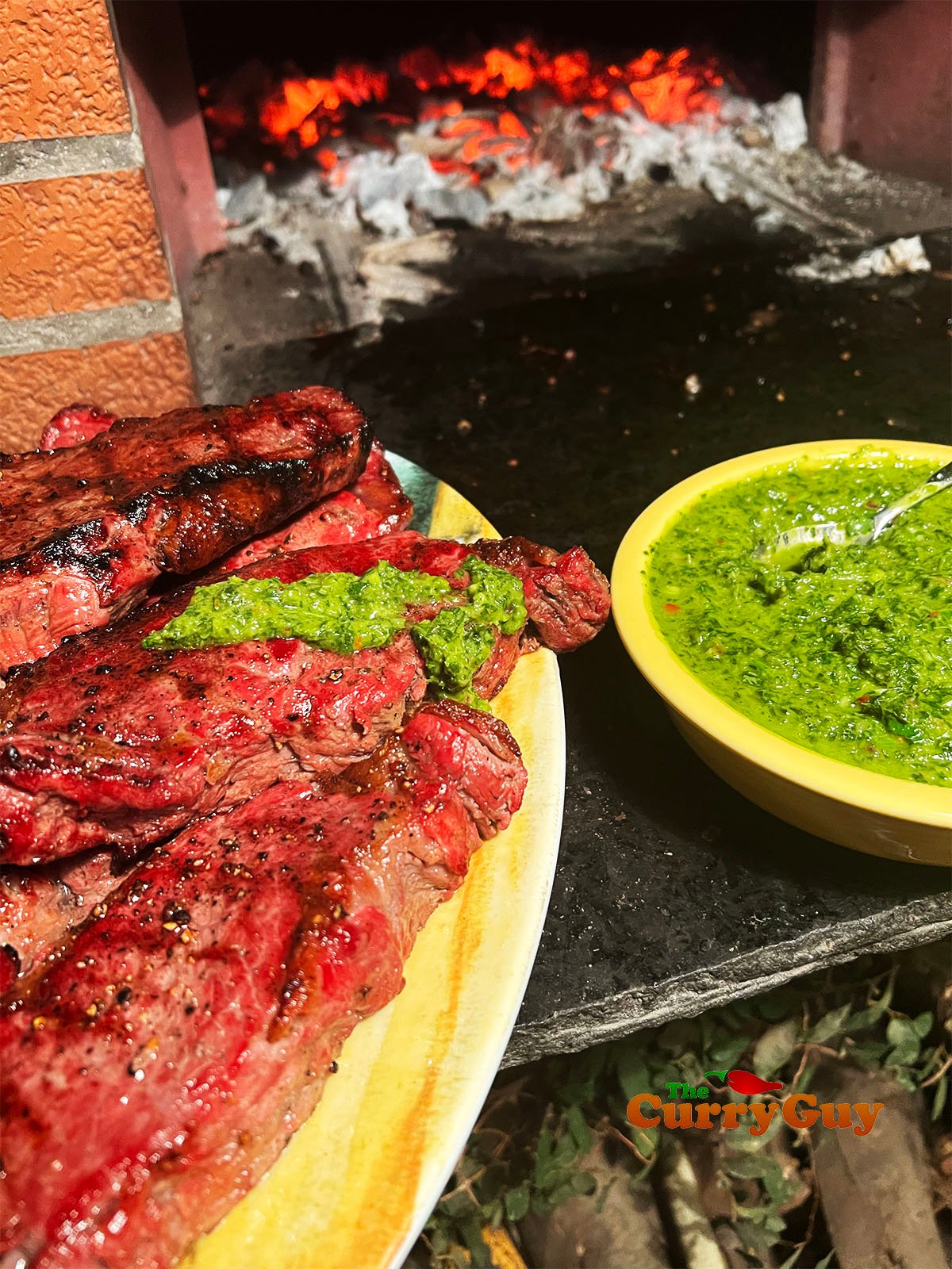 Chimichurri sauce on steak.