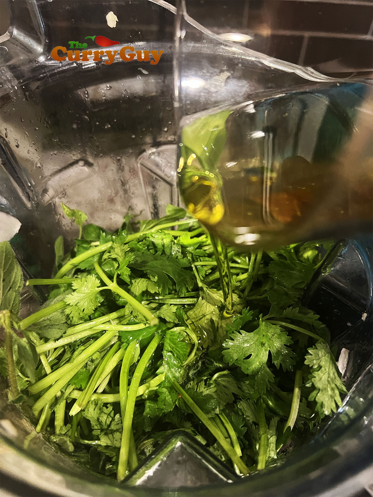 Adding the remaining ingredients to the blender.