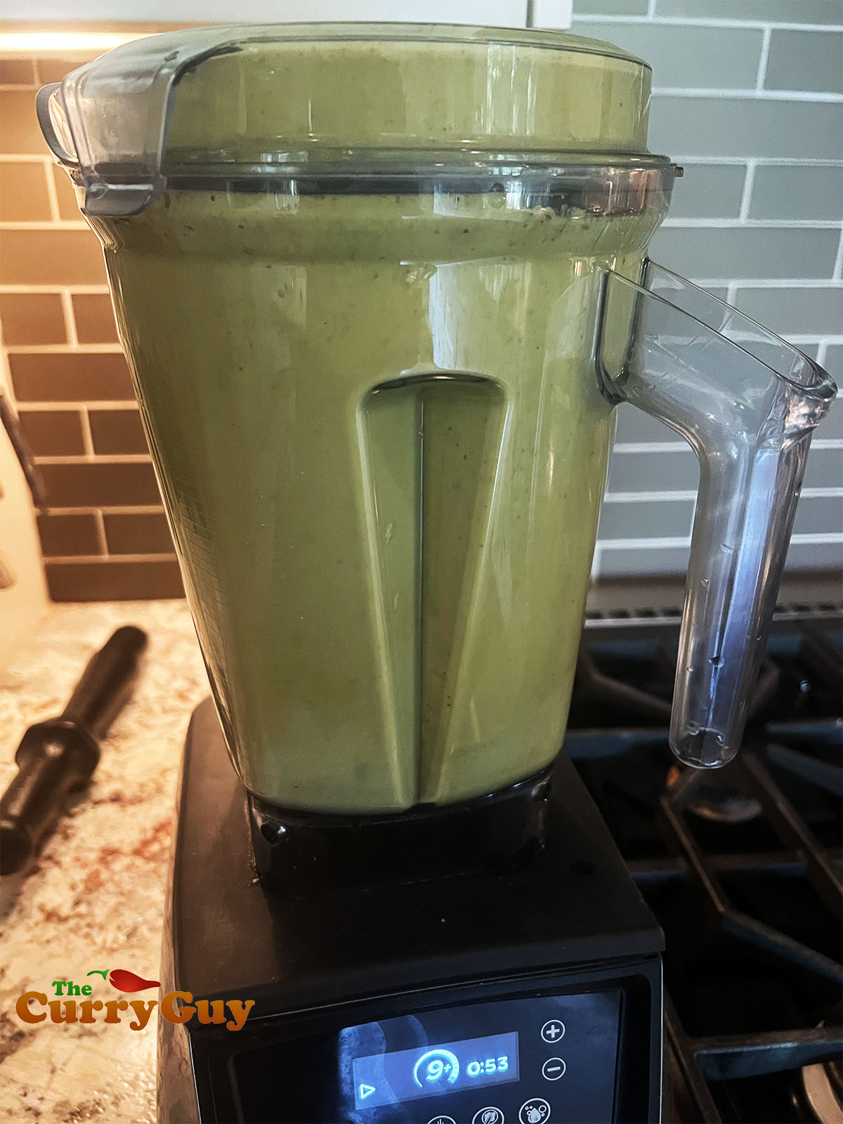 Blending the serrano hot sauce.