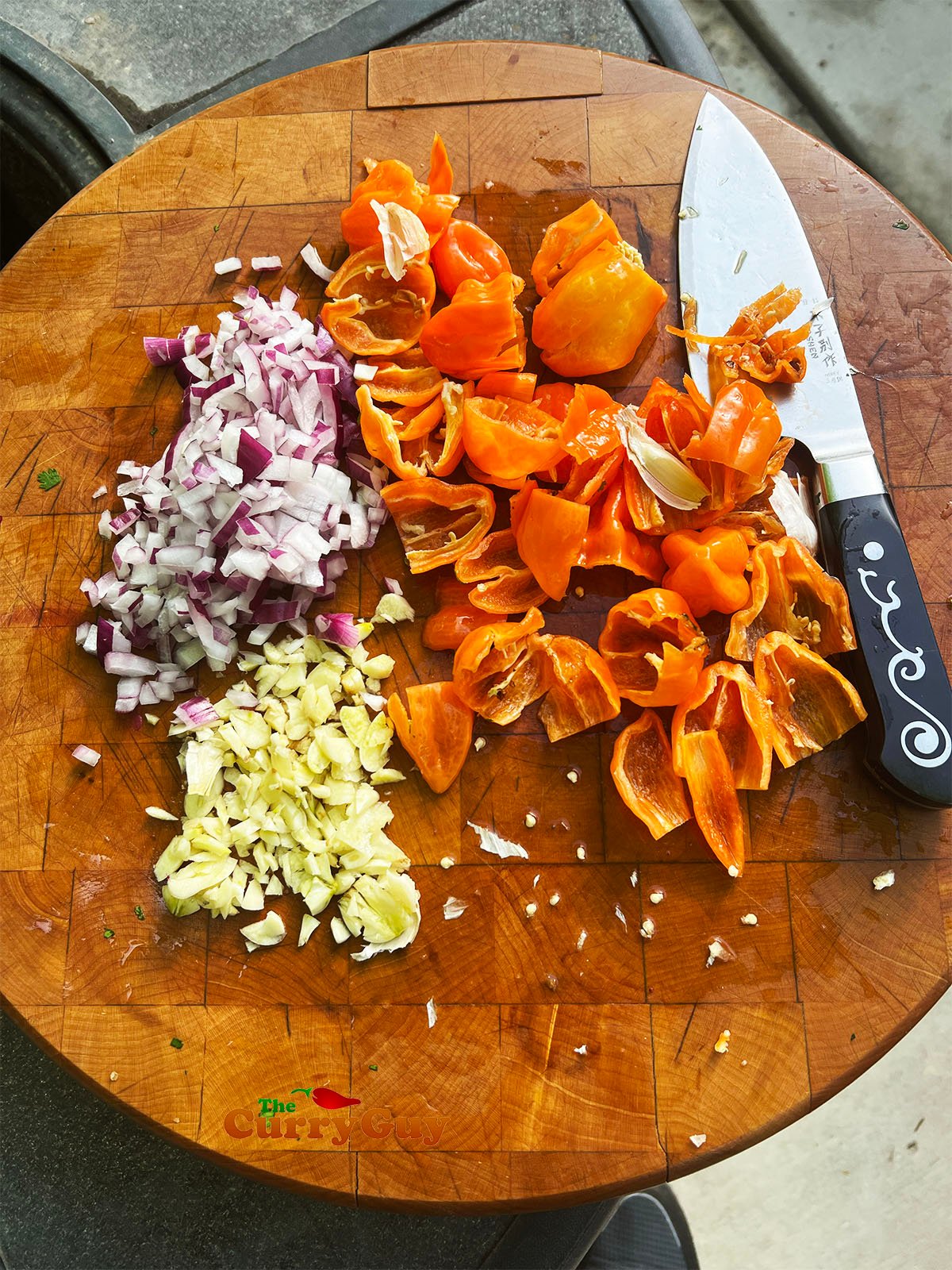 Chopped onion, habanero chilies and garlic.