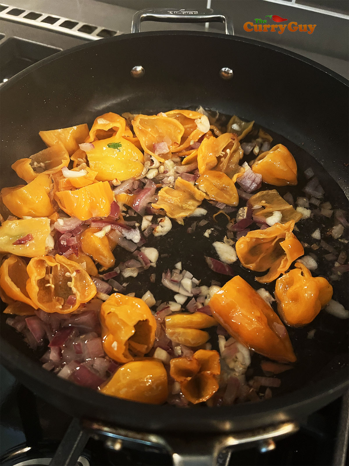 Adding the garlic to the pan