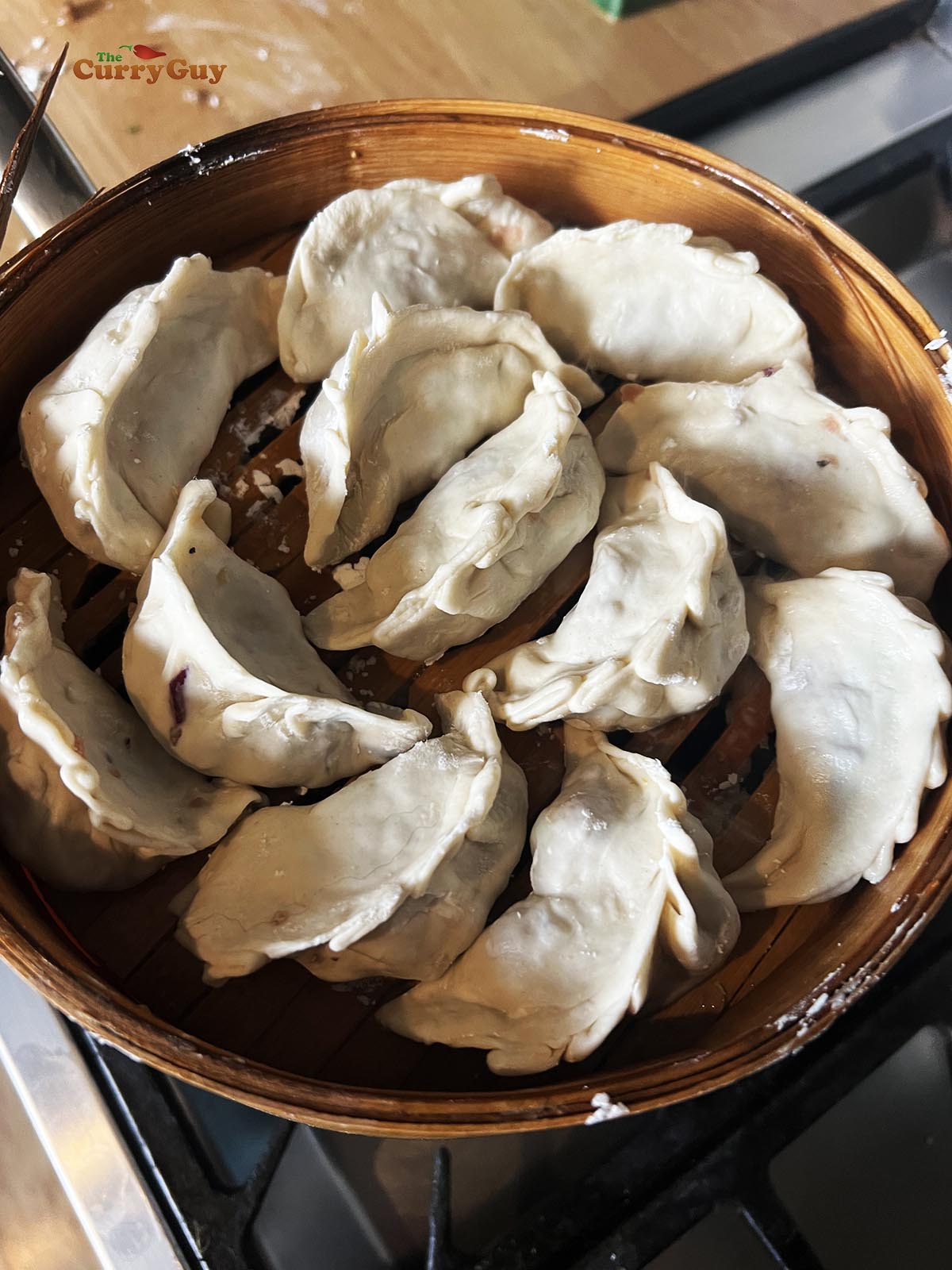 Steaming the beef momos.
