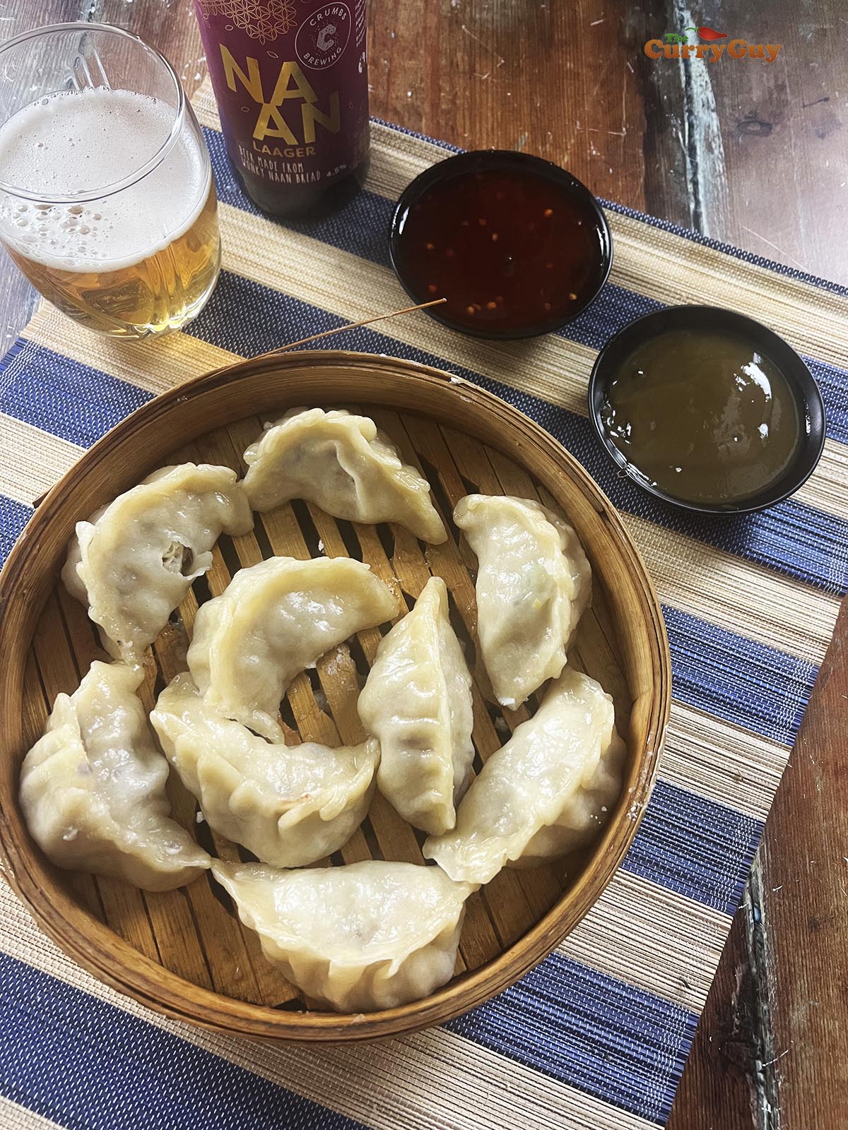 Serving the chicken momos.