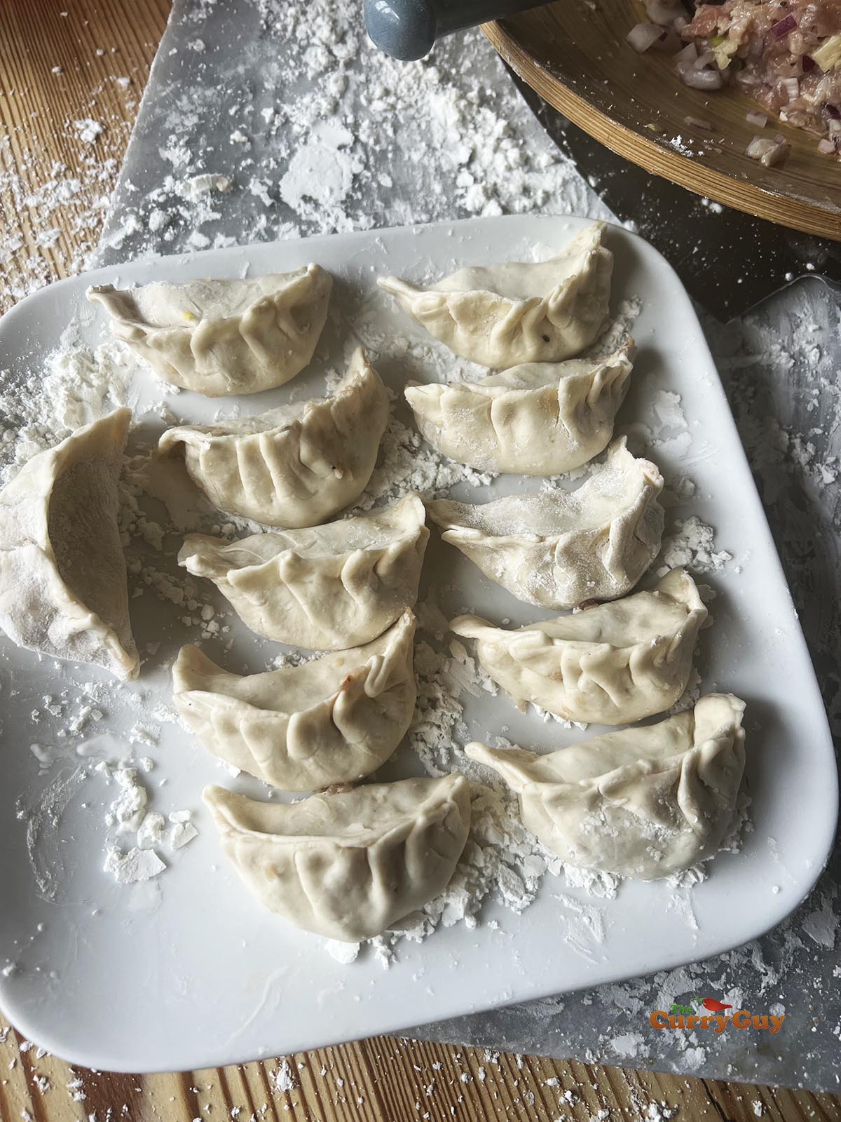 The finished chicken momos ready for steaming