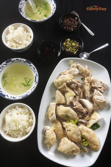 Hainan Chicken served with rice, chicken broth and dipping sauce.