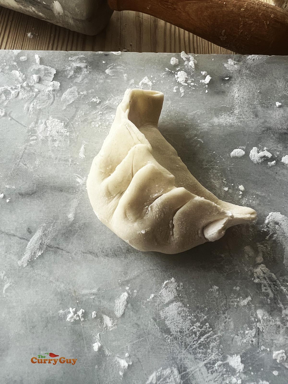 Finished potsticker ready for frying and steaming. 