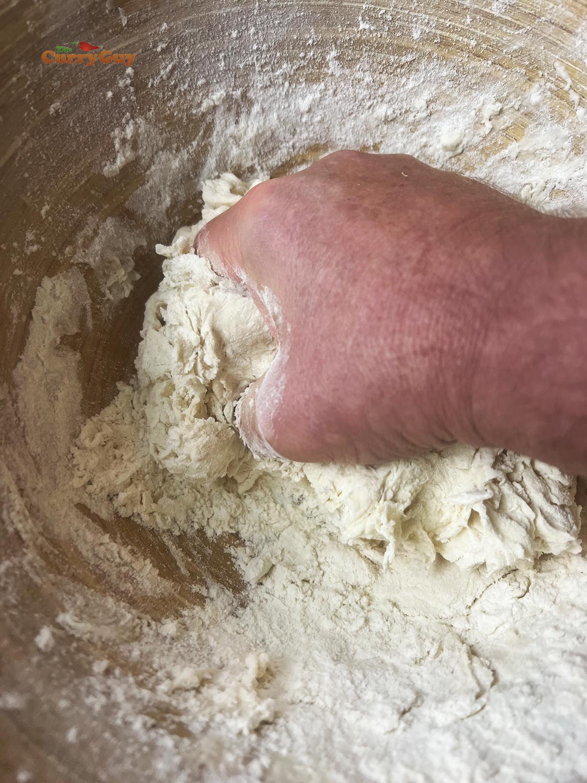Kneading the dough for the wrappers.