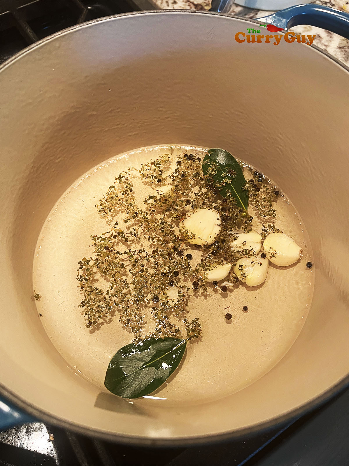 infusing the whole spices in a pan with oil.