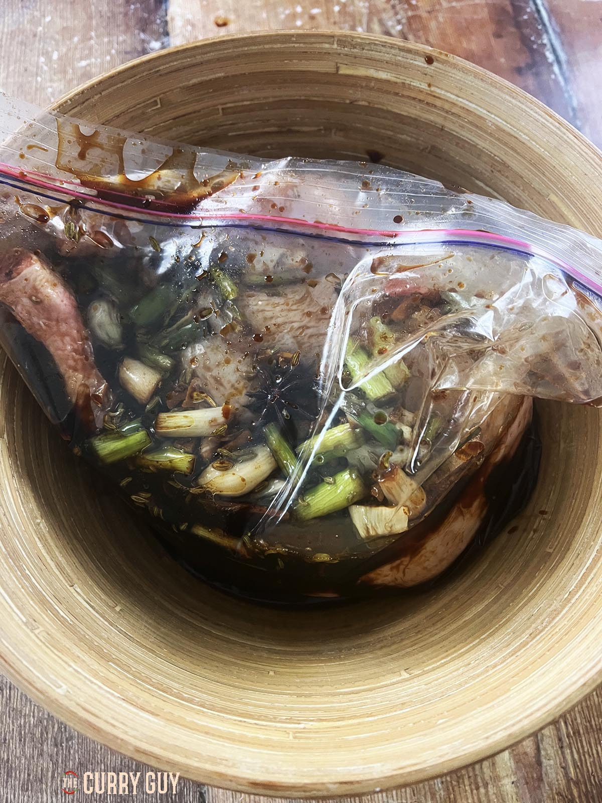 The chicken marinating.