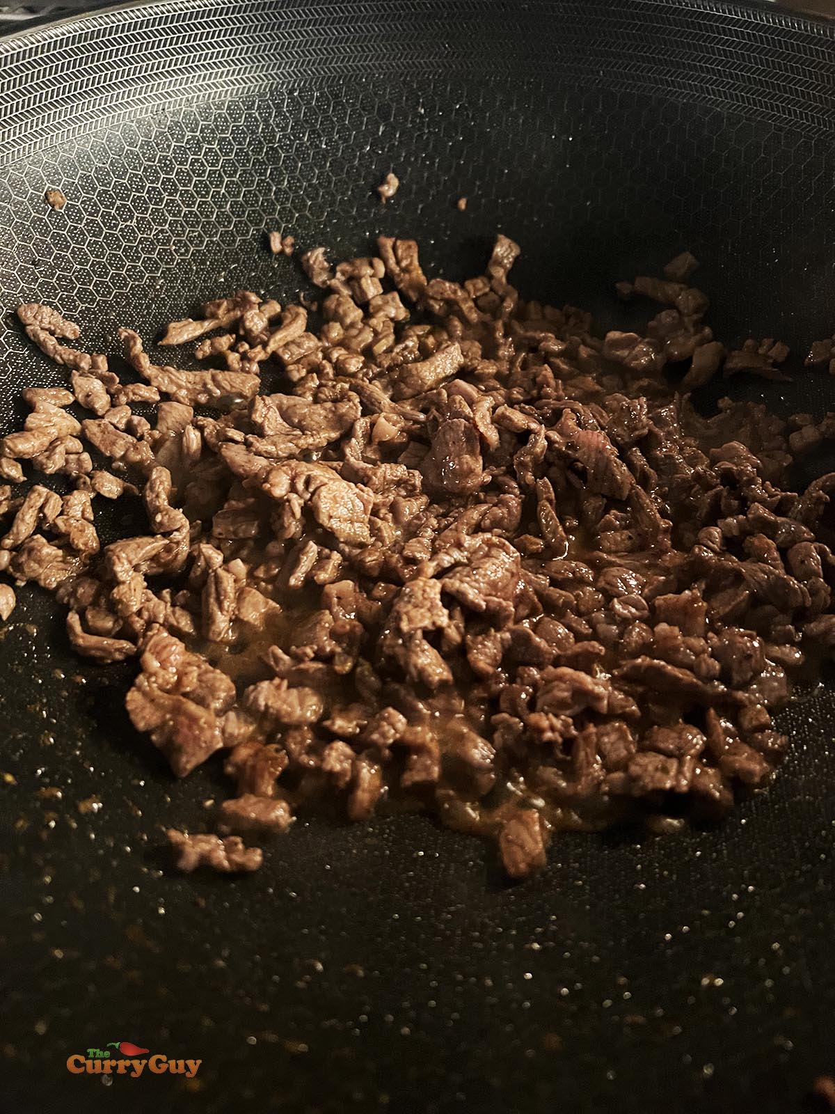 The fried meat ready for adding to tacos.