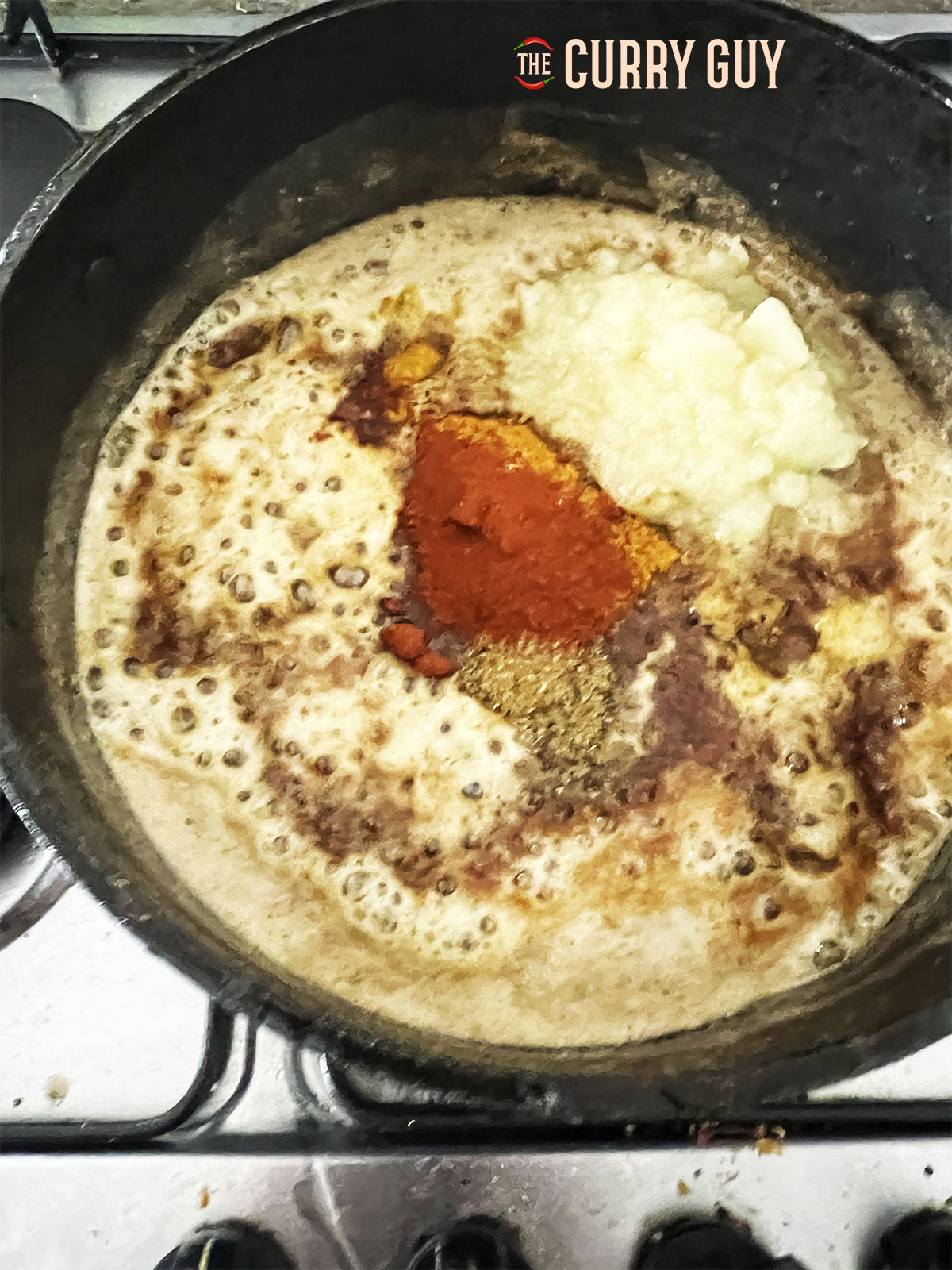 Adding the soy sauce, mirin and apple sauce to the roux.