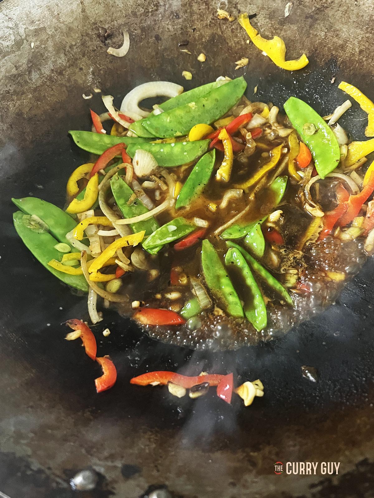 Adding the sauce ingredients.