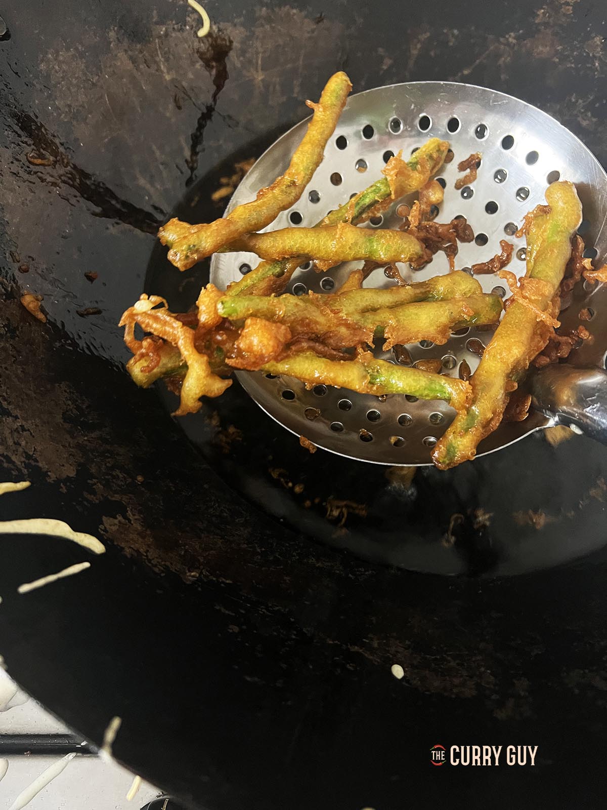 The cooked deep fried green beans.