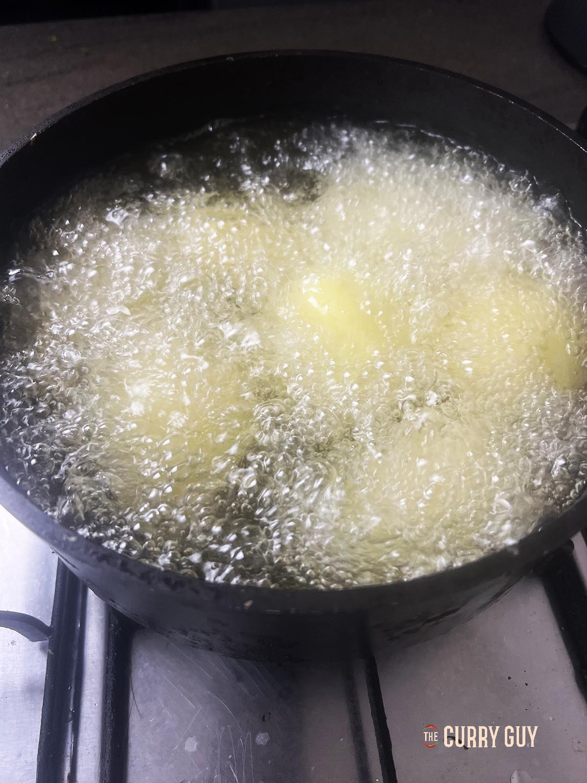 Frying the potatoes