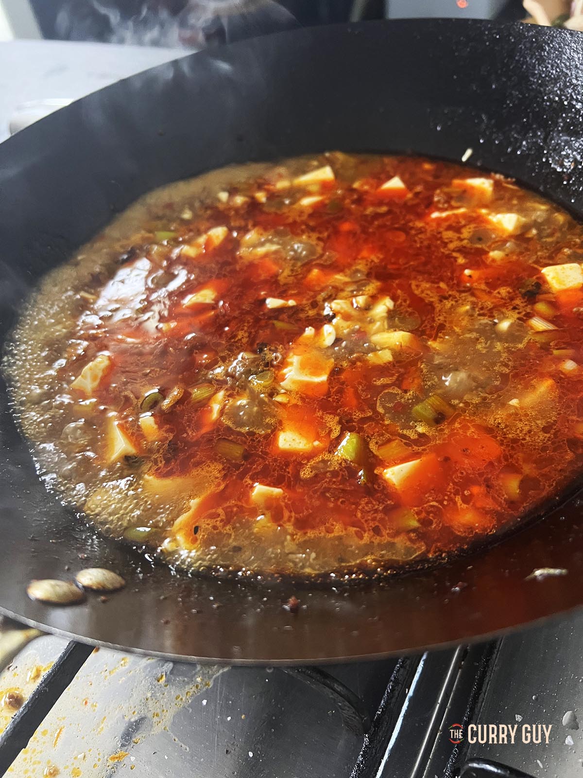 Simmering the sauce.