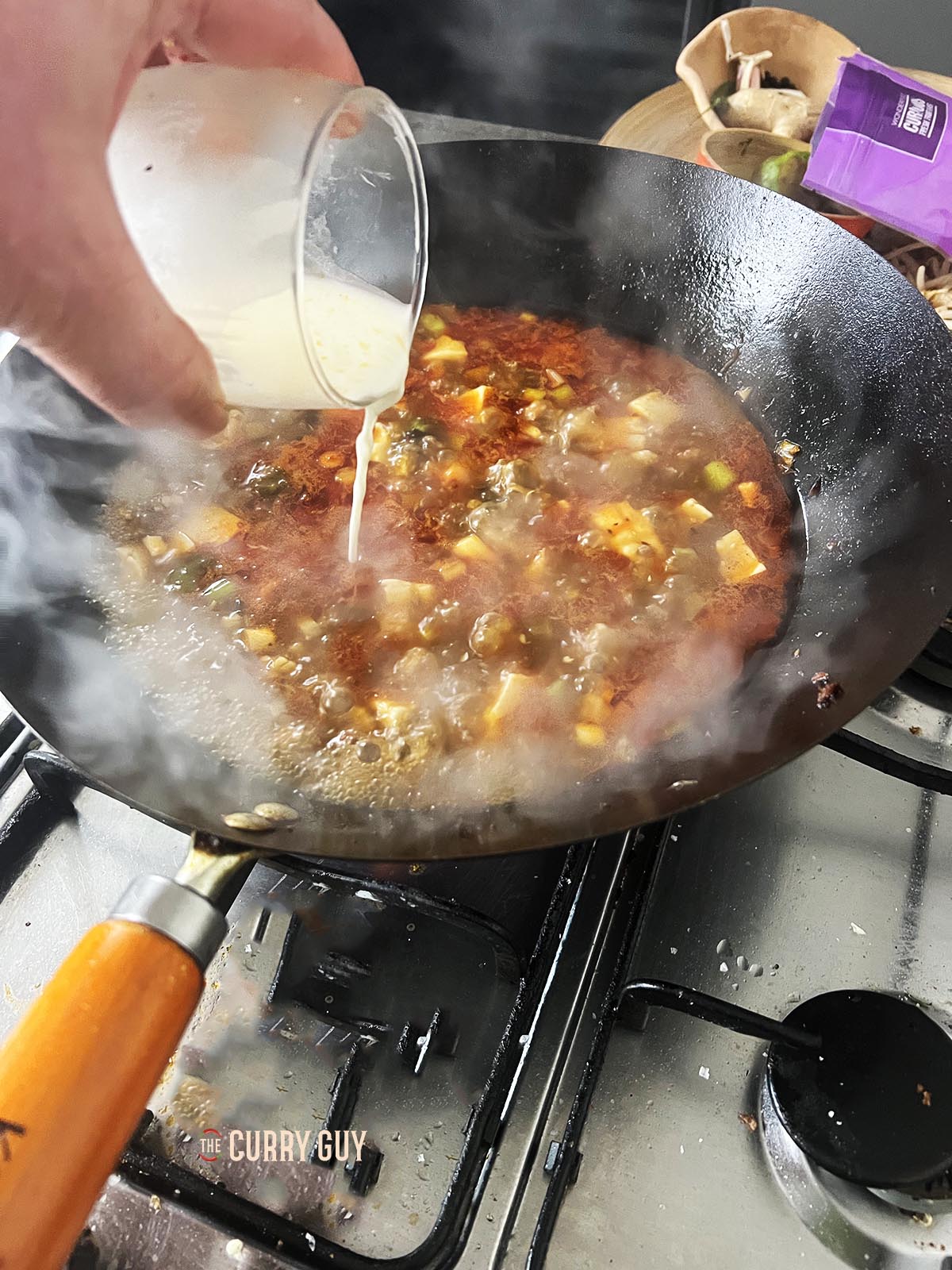 Adding the slurry to the stock.