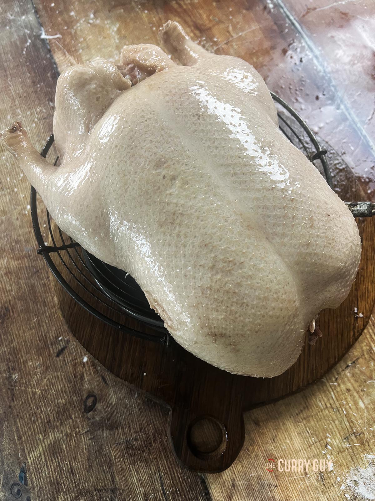 The duck with the maltose solution all over the skin.