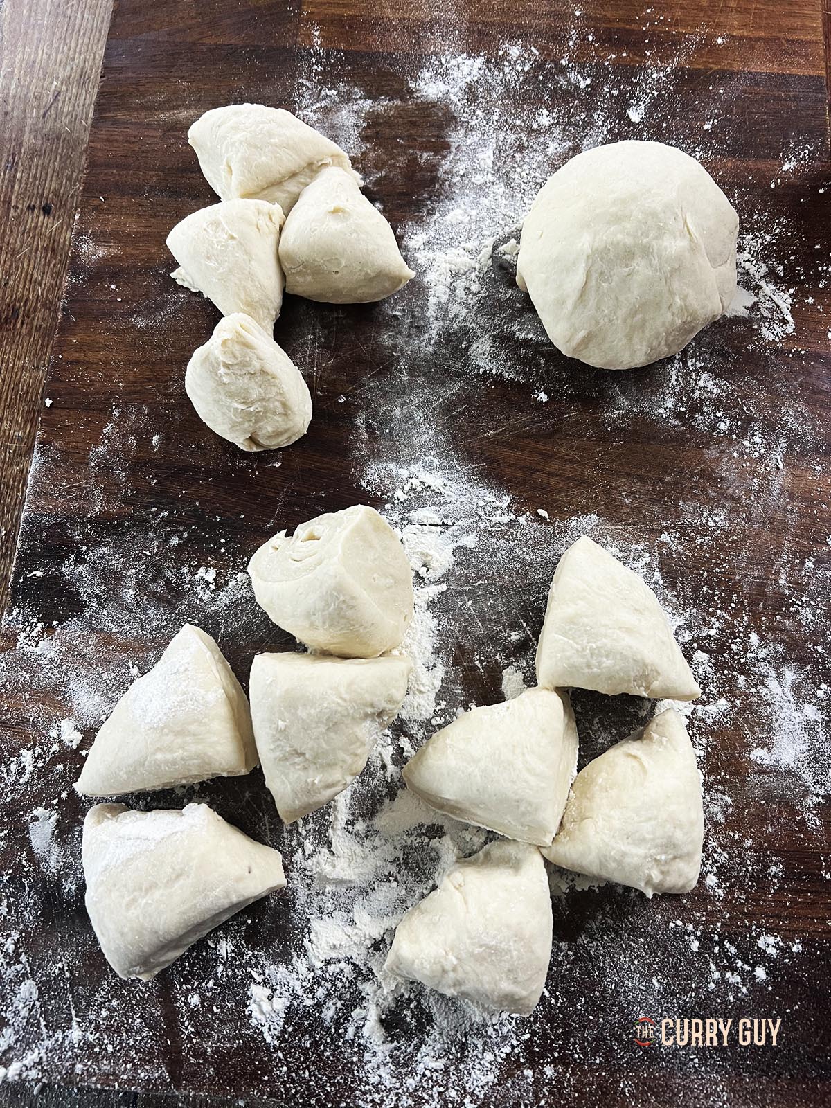 Preparing smaller dough balls for the pancakes.