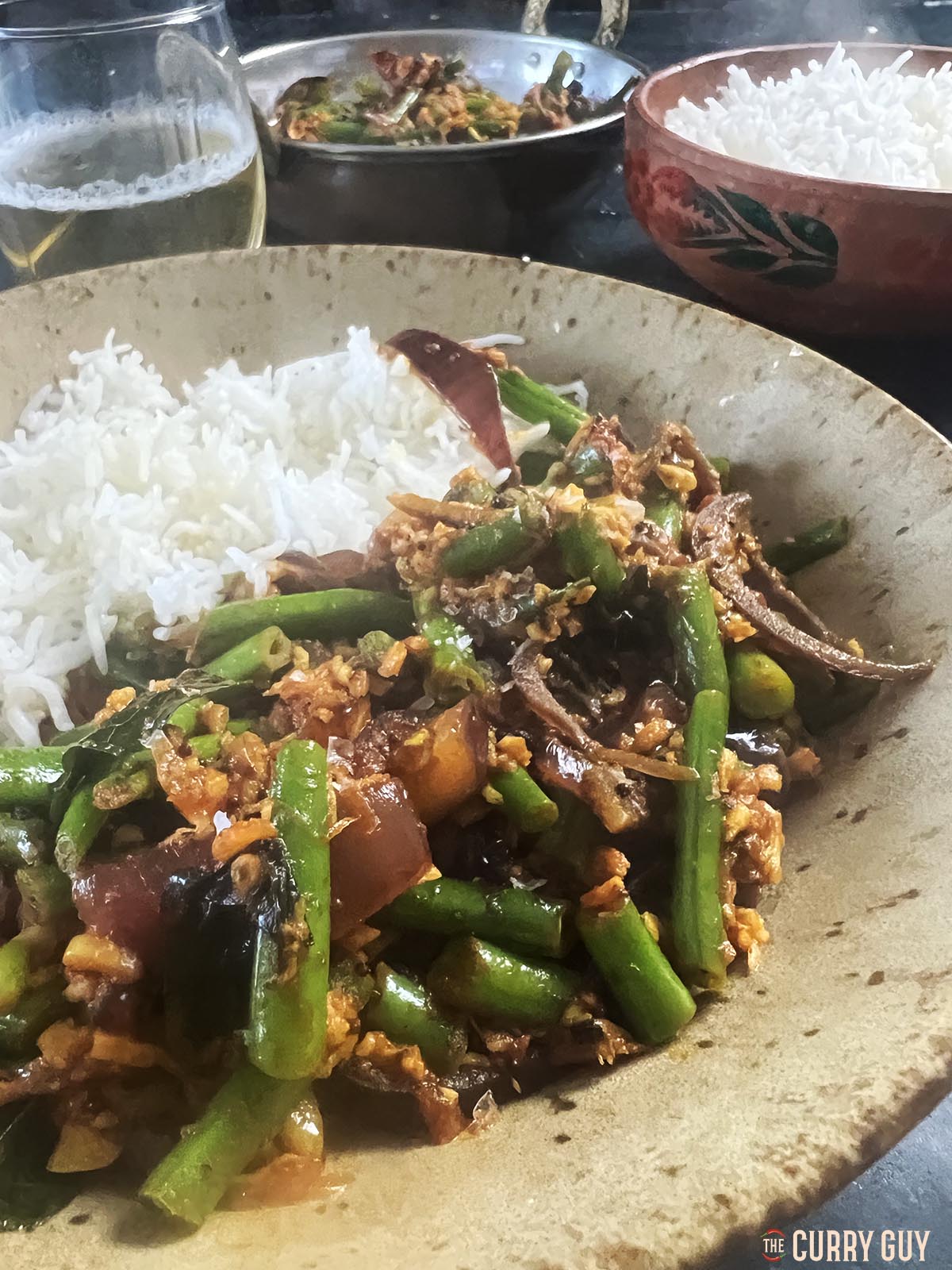 Seasoning and serving the green beans curry