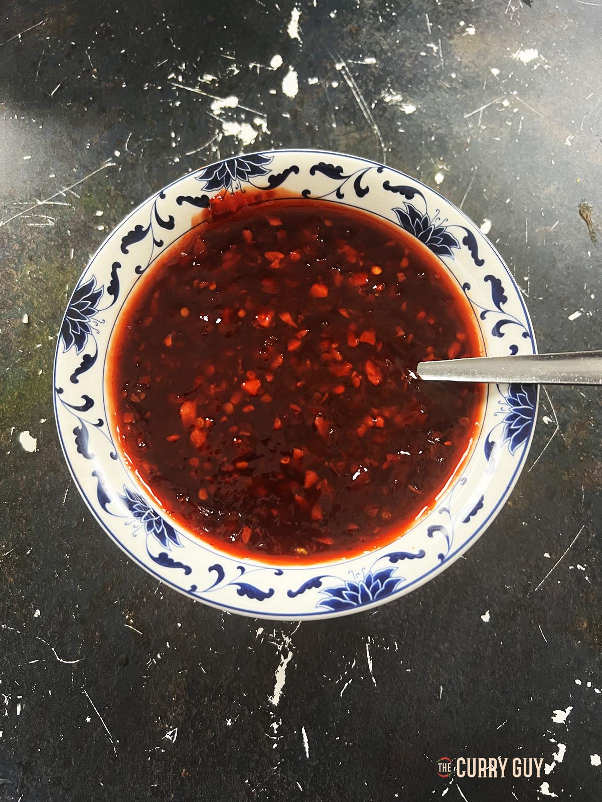 Homemade sweet chili sauce in a serving bowl.