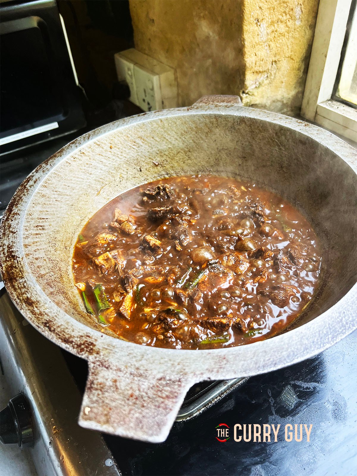 The finished Sri Lankan black chicken curry.