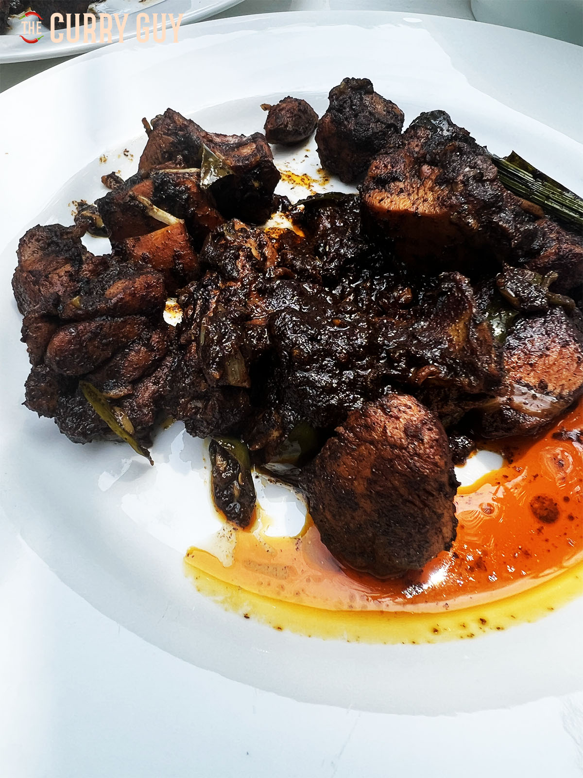 Sri Lankan black chicken curry.