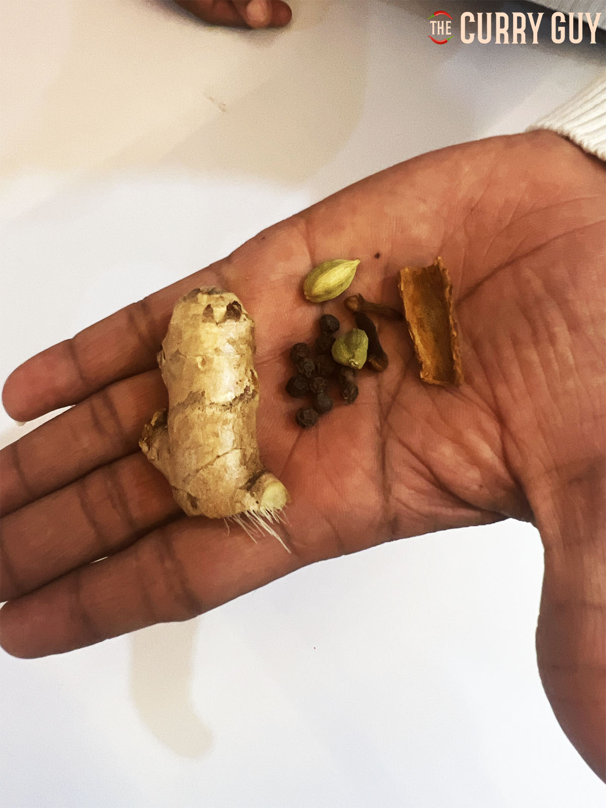 The spices and ginger needed for the masala chai.