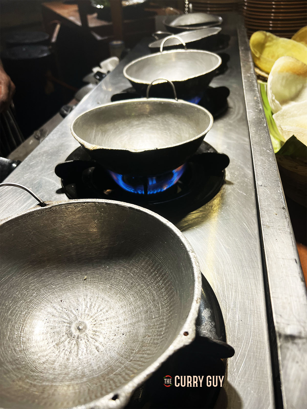 Hopper pans heating up over a medium-high heat.