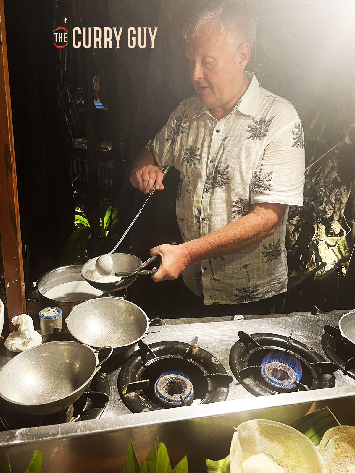 Adding a small ladleful of the batter to the pan.