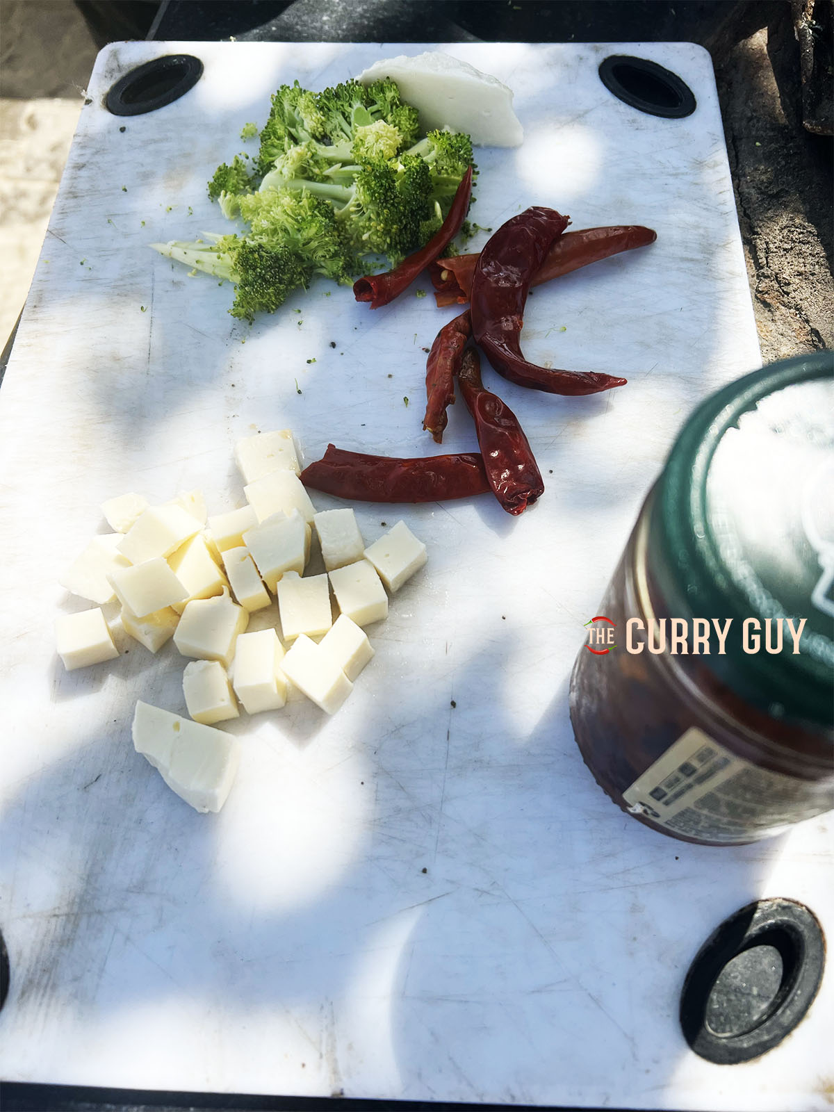 Getting the topping ingredients ready to add to the pizza.