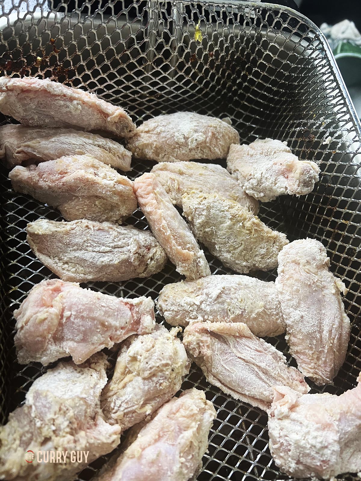 Chicken wings ready for frying.