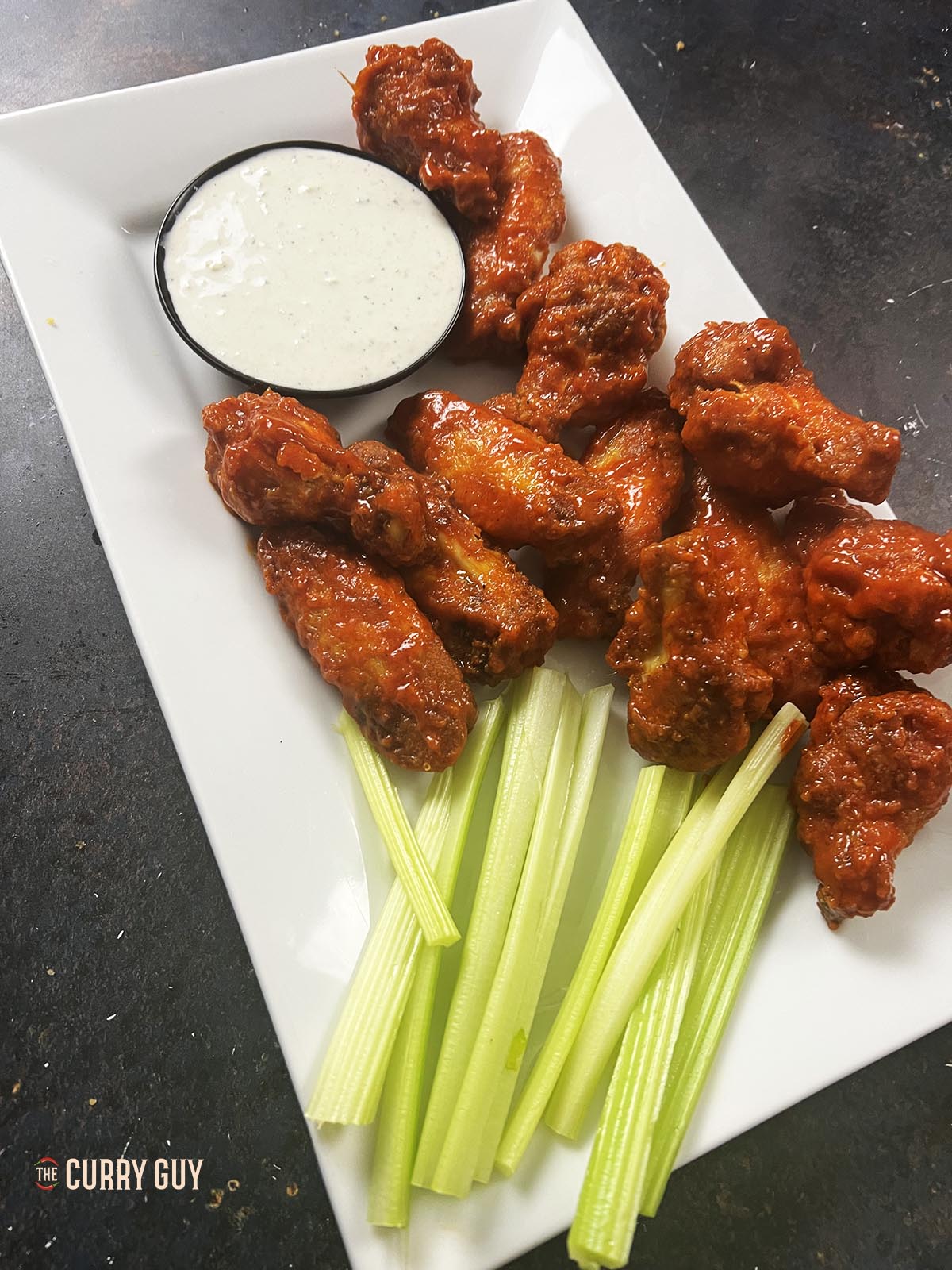 The Buffalo chicken wings served with celery and blue cheese dressing.