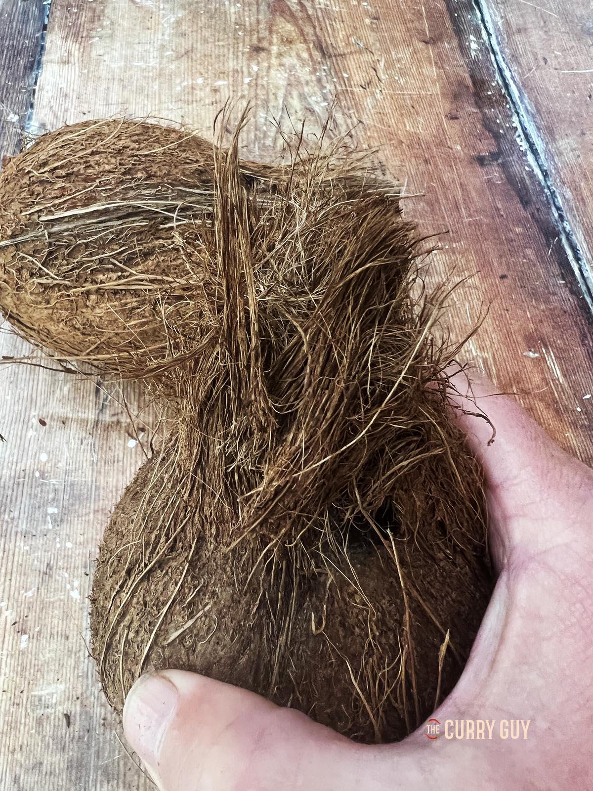 Showing the top of the coconut.