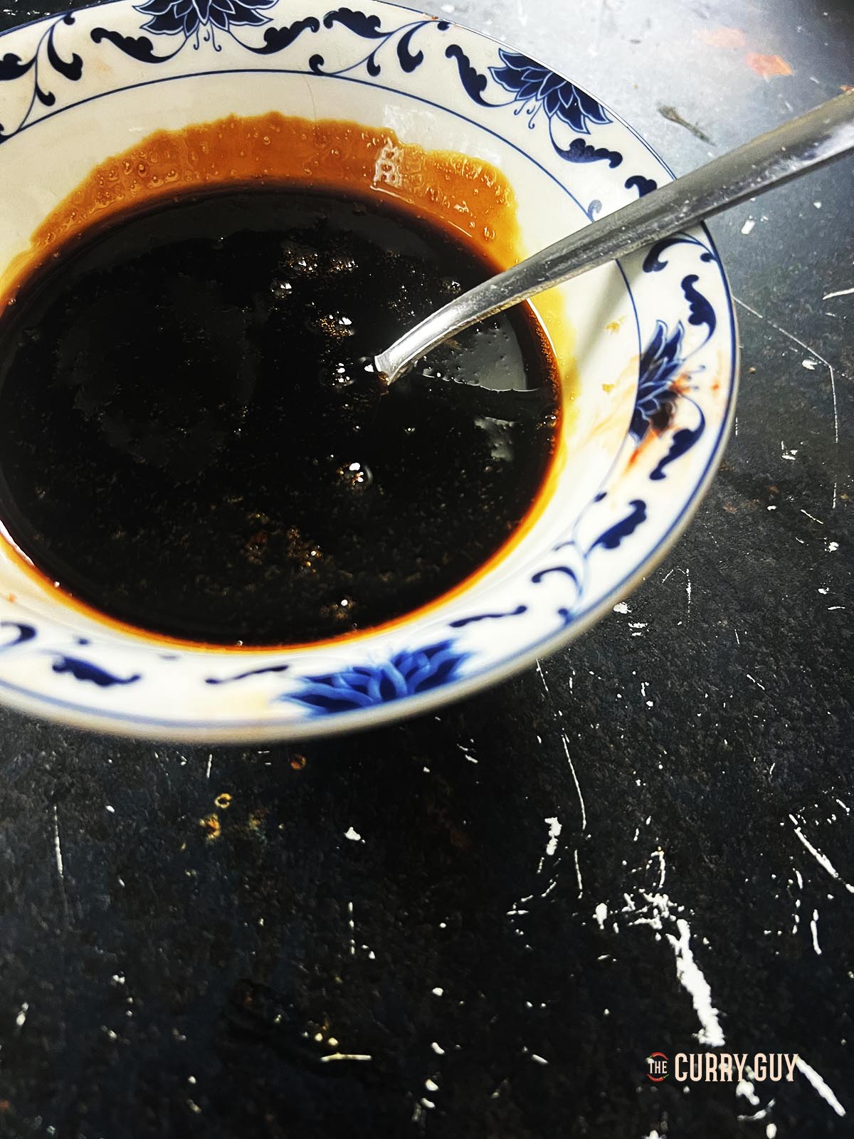 Cooling the sauce in a bowl.
