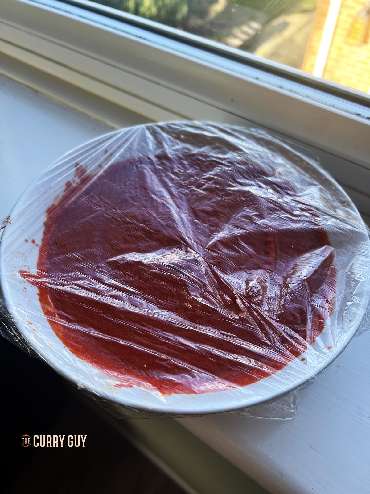 Fermenting the chilli paste at room temperature.