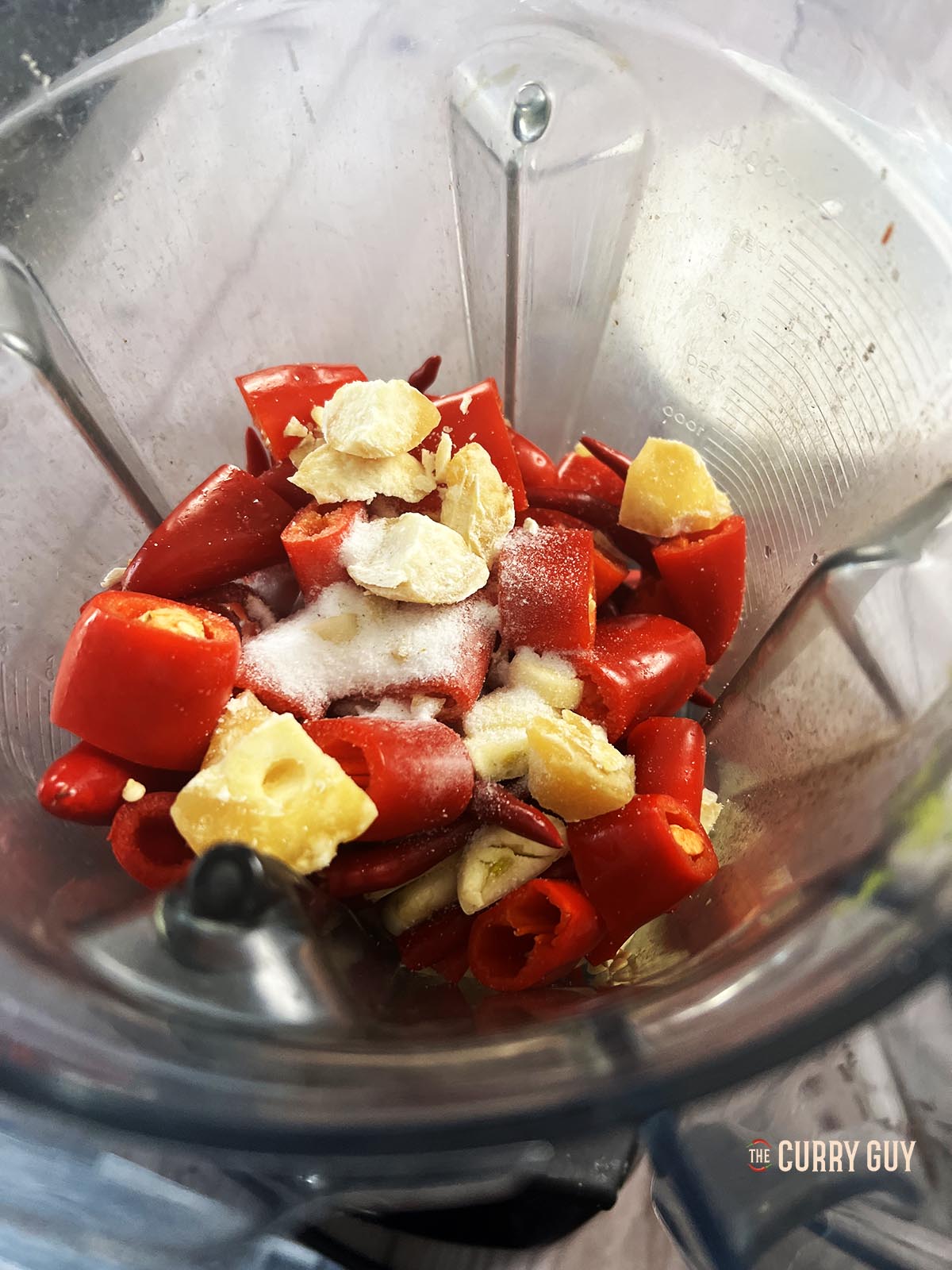 The chillies, garlic, salt and sugar ready to be blended.