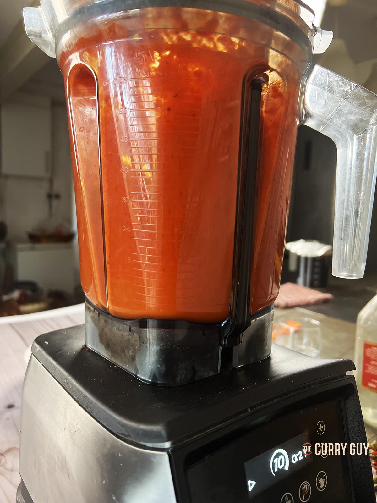 Blending the chillies and garlic into a paste