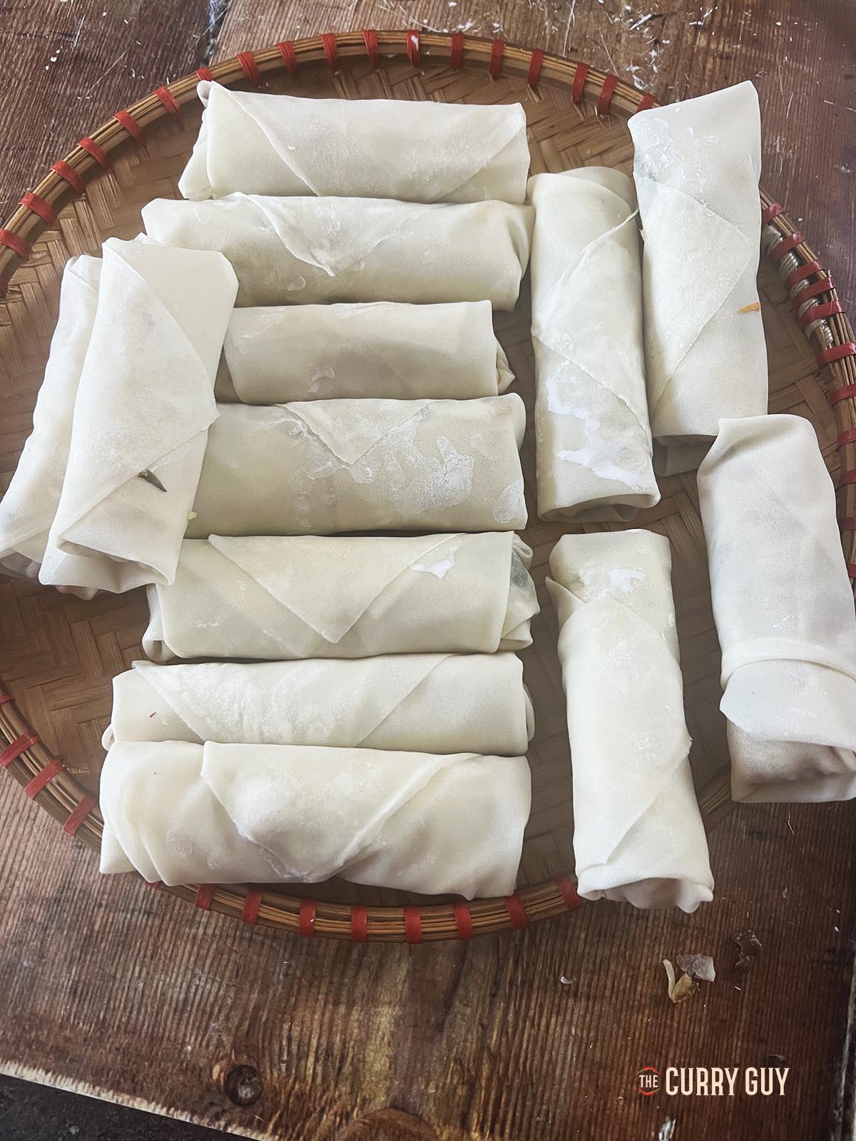 All of the rolled spring rolls ready for frying.