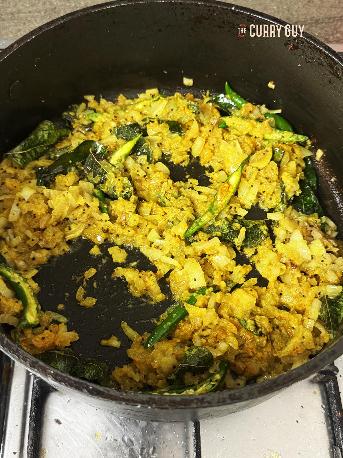 The curry base, bright yellow in colour. 