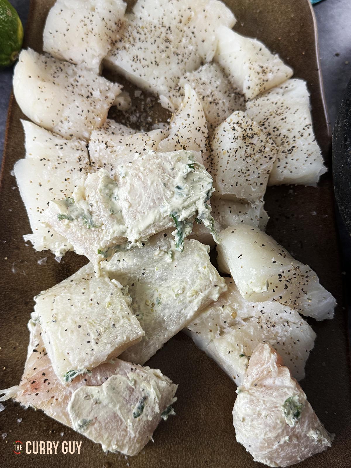 Marinating the fish for frying.