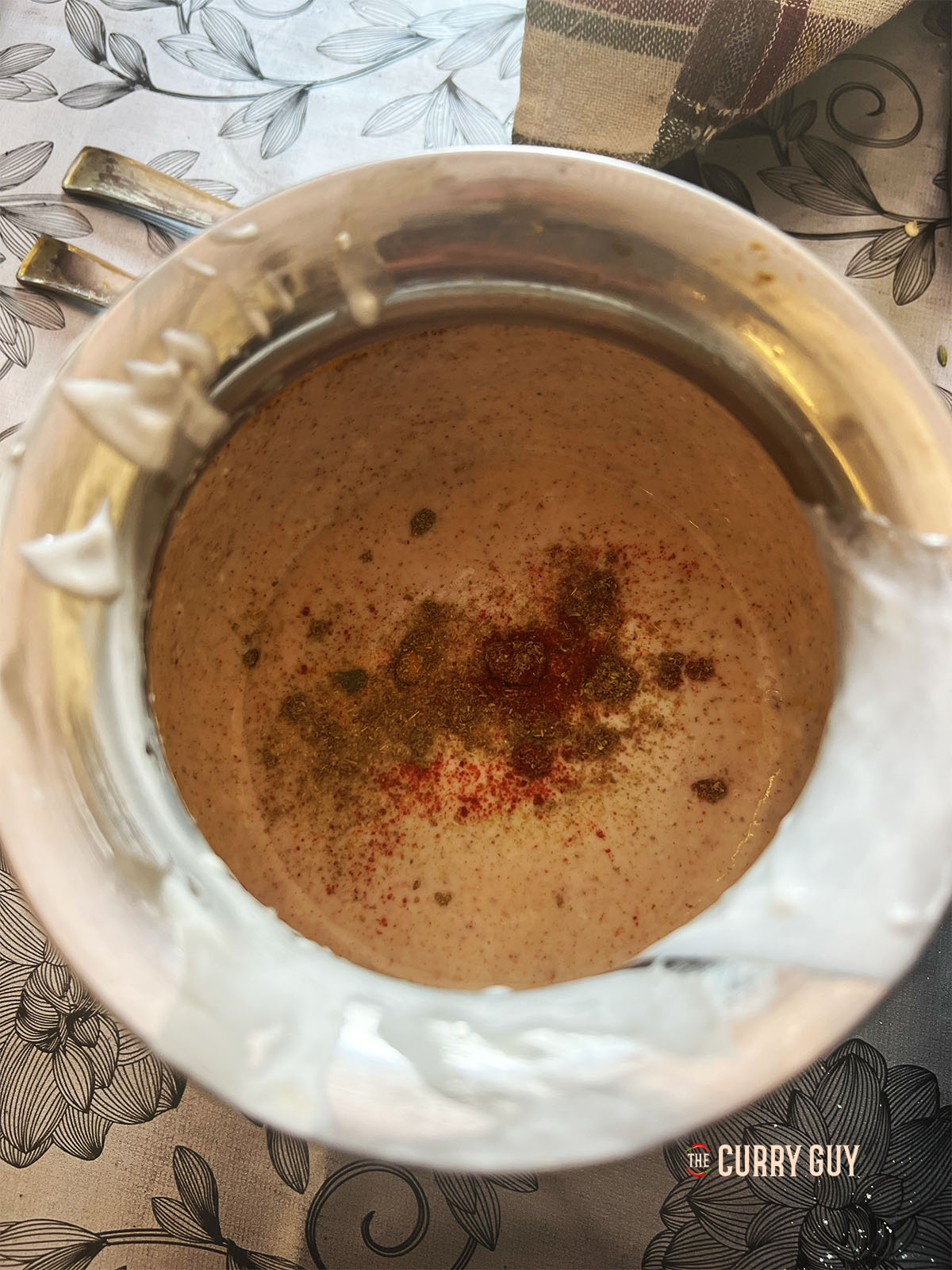 Whisking the yoghurt sauce together.