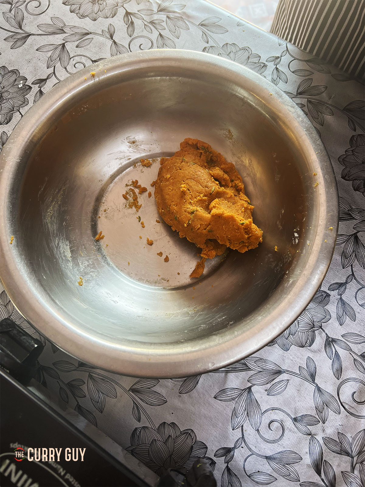 Making the dough for the gram flour dumplings.