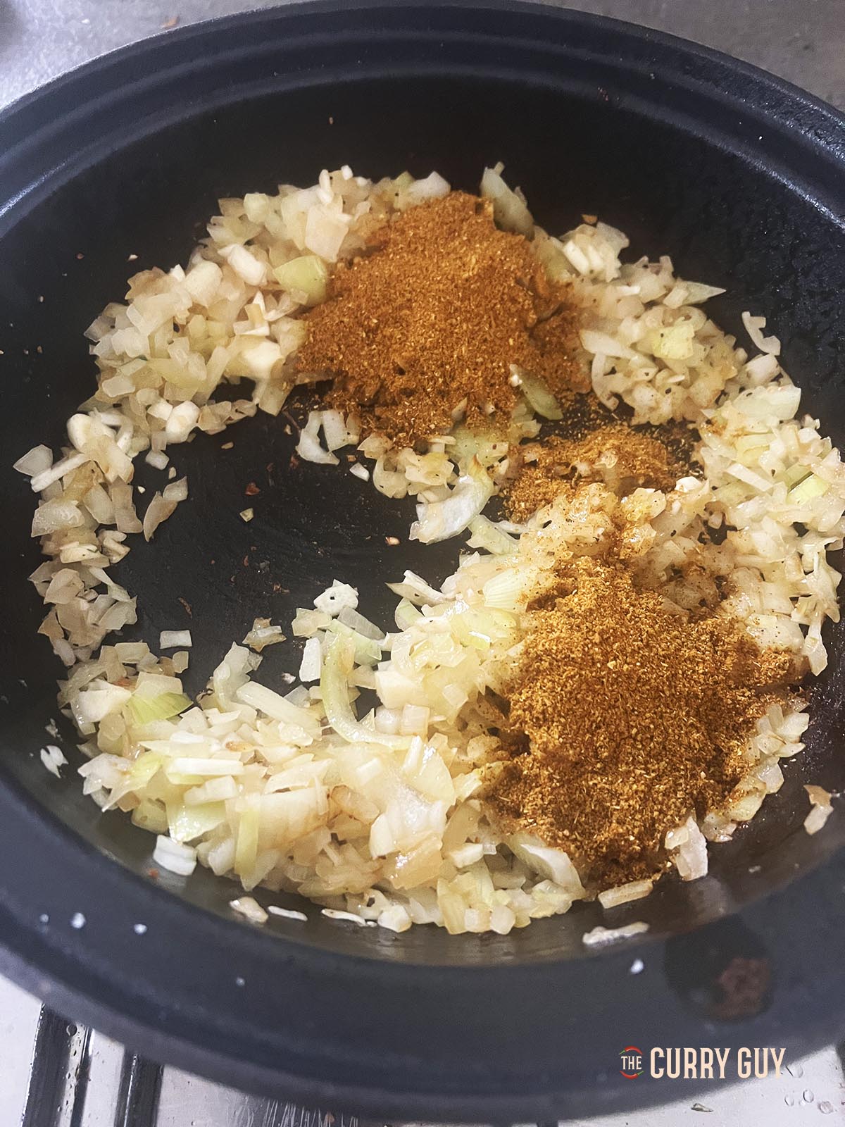 Adding the ground spices.