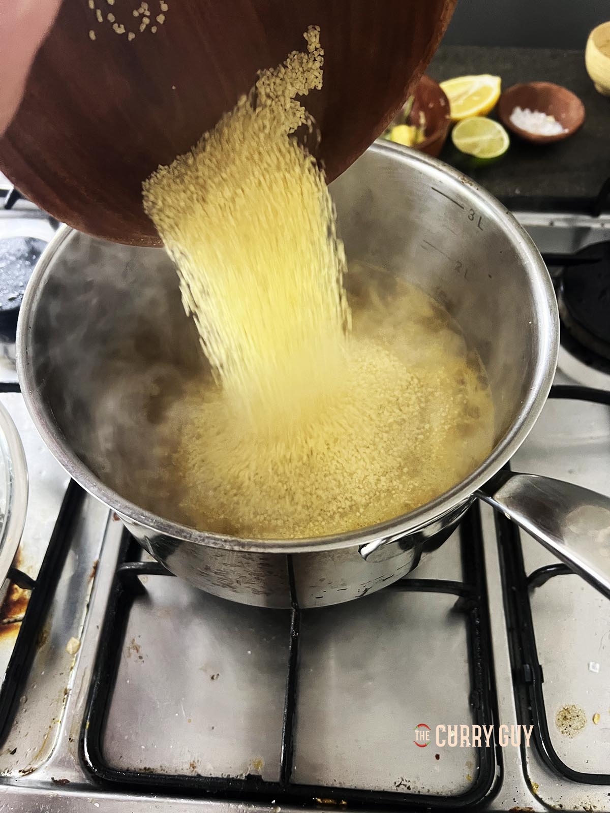 Pouring in the couscous.