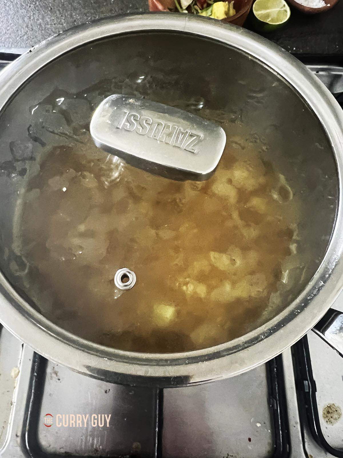 Cover the pan to steam the couscous.