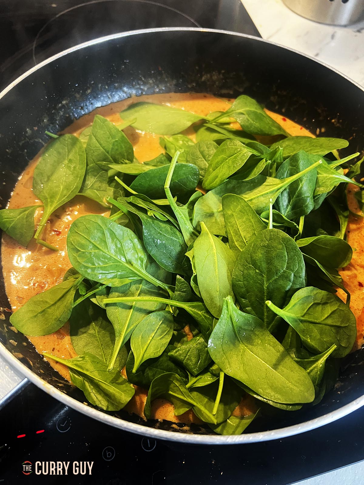 Spinach going in pan